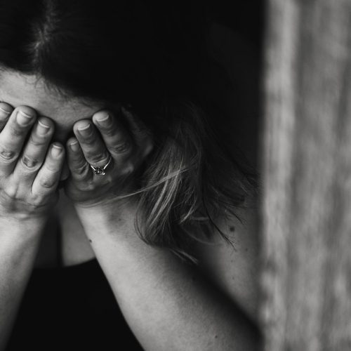 Grayscale Photography of Crying Woman